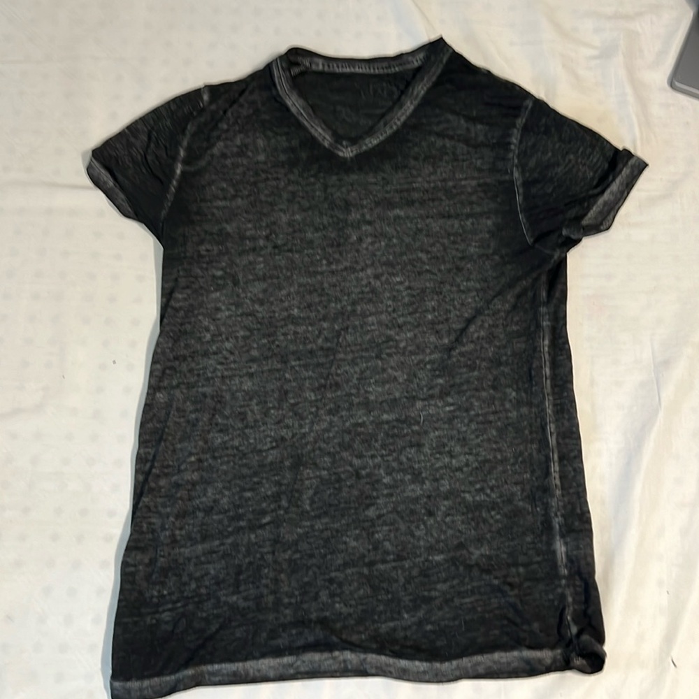 Very thin buckle black v-neck that is very good for a hot summer day